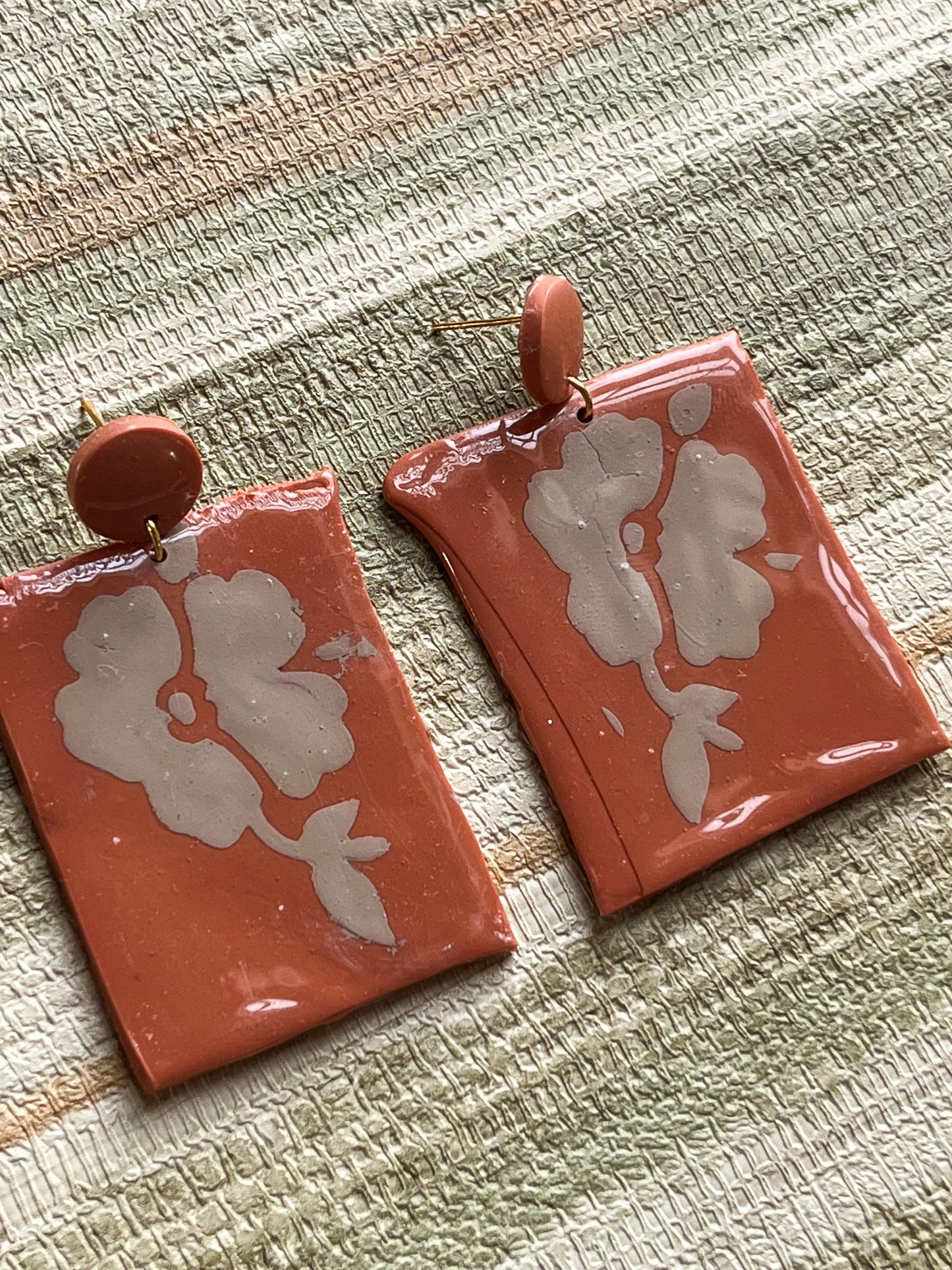 Painted Flower on Rust Red Dangles