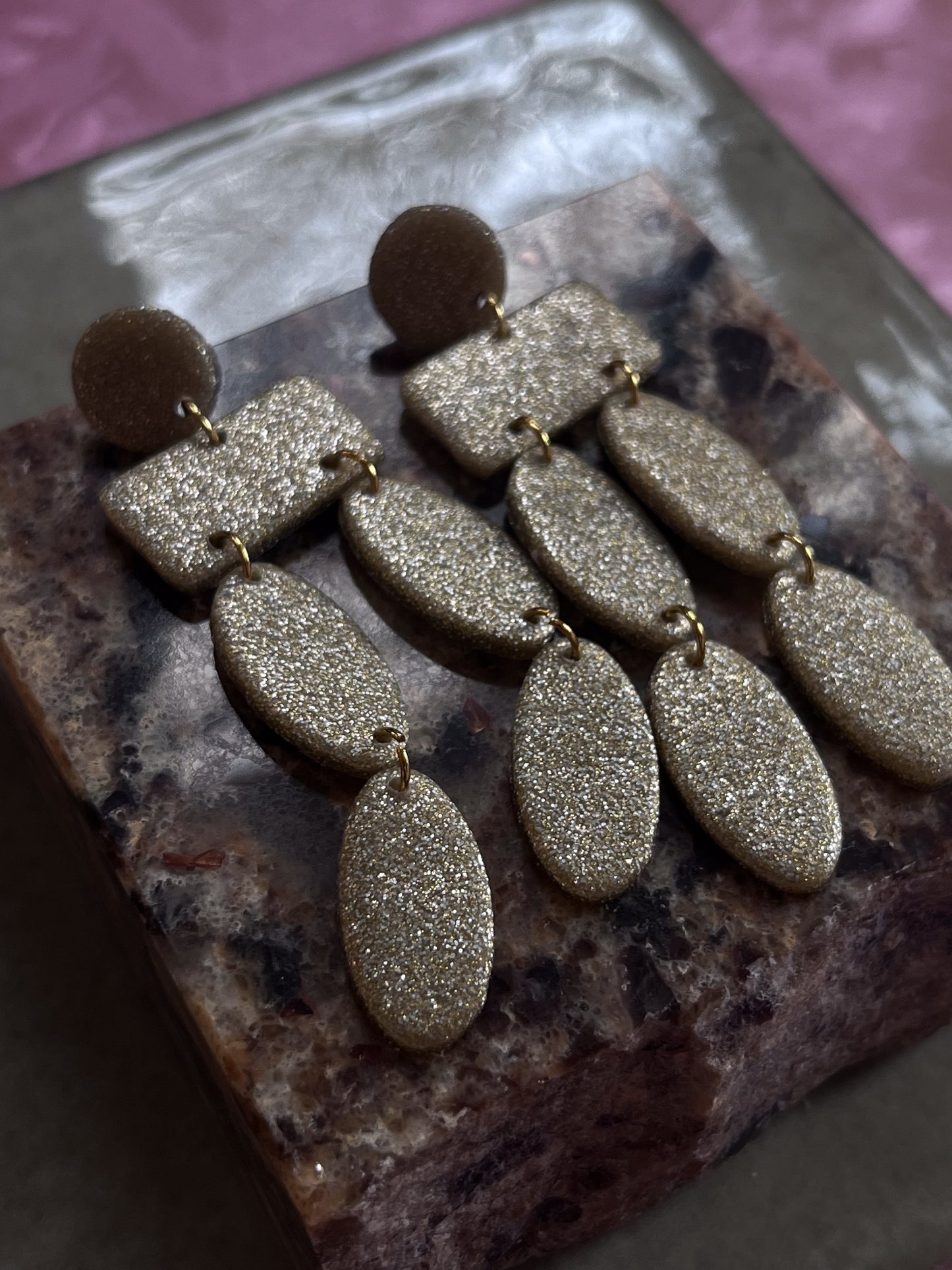 Christina Dangles in a Sparkled Gold