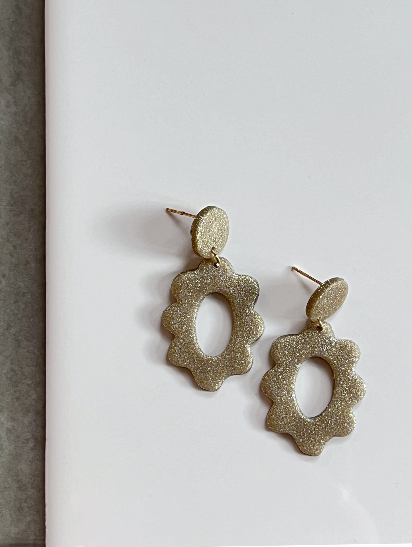 Floral Dangle in a Sparkly Gold