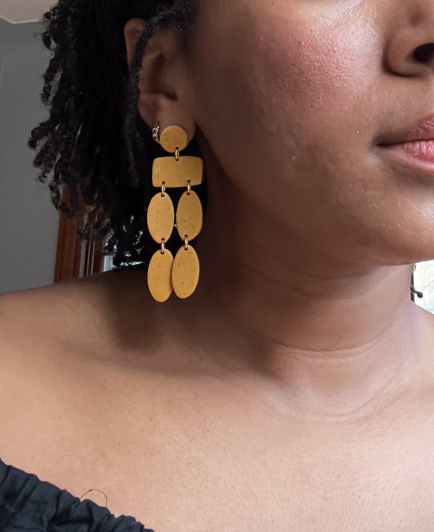 Christina Dangles in Mustard Yellow